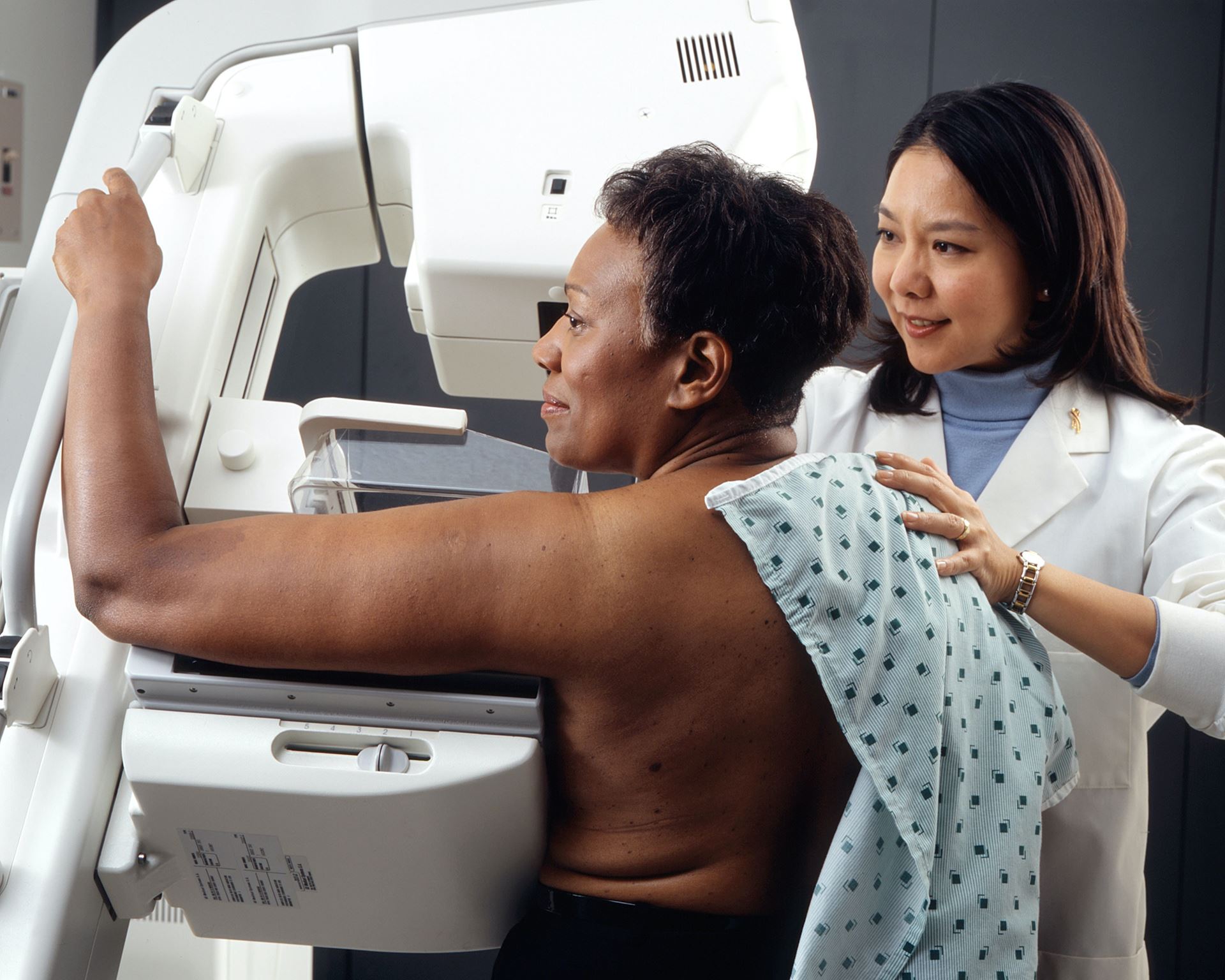 a woman getting a mammogram