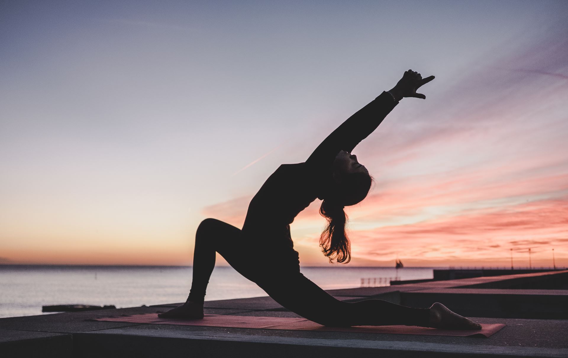 a woman in a yoga post